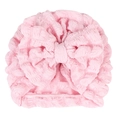 Turbante neonato rosa in maglia a nido d'ape con grande fiocco su sfondo bianco - Rosa