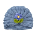 Knitted baby turban hat in dusty blue featuring a colorful crochet flower ornament - Blue