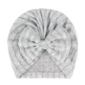 Detail view of grey newborn baby hat with large decorative bow and striped texture - Gray