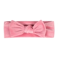Close-up of pink corduroy baby headband featuring a large bow and ribbed texture - Dusty Pink