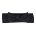 Detail of a deep black elastic baby headband with textured fabric and a large bow design - Black