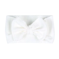 Soft white waffle knit baby headband with oversized bow for newborns and infants - White (Ribbed)