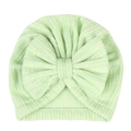 Detailed macro view of mint green ribbed knit fabric and large bow on the baby turban hat - Breathable Vertical Stripe / Green