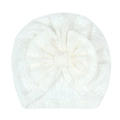 Dettaglio del turbante bianco per neonati con trama in pizzo e grande fiocco decorativo - Bianco