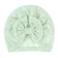 Detail of light green breathable lace newborn hat featuring a delicate jacquard bow design - Green