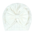 Détail du bonnet turban blanc pour nouveau-né avec grand nœud et tissu jacquard texturé - Blanc