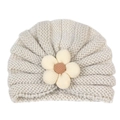 Detailed knit texture of beige baby beanie with 3D five-petal floral applique - White