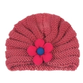 Detail of baby knitted turban hat featuring pink floral petal and blue center contrast - Dusty Pink