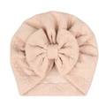 Detail view of baby bow beanie featuring pink quilted texture and oversized bow ornament - Light Coffee