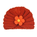 Close-up of bright orange ribbed knit baby hat with decorative 3D fabric flower detail - Orange