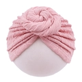 Detail of baby donut knot turban hat in soft pink knit with ripple texture on white background - Dust Rose