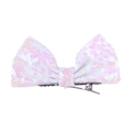 Detailed view of 4-inch white sequin bow hair clip with shimmering iridescent glitter effect - Iridescent White
