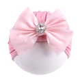 Détail du bonnet turban rose pour nouveau-né avec grand nœud en soie et boucle diamant - Chapeau Seul / Vieux rose