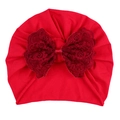 Infant red turban hat with a large lace bow and delicate floral embroidery detail - Red Hat