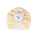 Fleece baby hat in pale yellow with a cute teddy bear embroidery and warm double layers - One Size / Beige