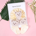 Detail of baby hat and socks set in pale yellow with cute 3D plush bear patches - Bear Style (Bonnet Socks) / Khaki