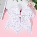 Detail shot of white ribbon bow hair tie with shiny rhinestones for girls' party hairstyles - White