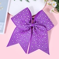 Macro view of purple grosgrain bow hair clip featuring multilayer design and white rhinestones - Purple