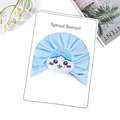 Light blue newborn turban bonnet featuring a cute white cat patch on display card - Cat Style (Hat Only) / Blue