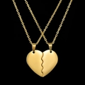 Matching gold stainless steel couple necklaces with interlocking heart shaped pendants - Gold