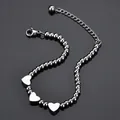 Polished silver titanium steel bead bracelet with three heart charms and adjustable chain - Silver (SFLB356)