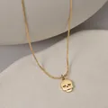 Gold stainless steel necklace with a hollow skull pendant and heart-shaped eyes charm - Gold Skull Style (S-N1940)
