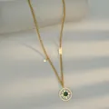 Vintage 14K vergoldete Sonnenkette mit grünem Malachitstein auf strukturiertem Hintergrund - Vintage Sonnenstrahl Grüner Stein Stil (S-N1541)