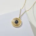 Vintage gold necklace with round turquoise relief pendant on white minimalist display - Black Marble Style (SFLN907-hei)