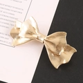 Elegante gouden metalen haarclip met strik en gestructureerd dubbellaags ontwerp voor dames - Goud