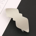 Sleek silver matte metal hair clip with abstract geometric design and brushed finish - Silver