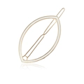 Elegant gold metal shuttle-shaped hair clip with white enamel finish on white background - White