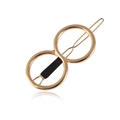 Detail view of gold metal hair clip with double circle infinity design and black rubber grip - Anti-slip Style (With Black Sleeve) / Gold