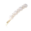Elegante fermaglio per capelli dorato con perle bianche in un design dallo stile sobrio - Oro