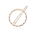 Elegante fermaglio per capelli rotondo dorato con perle lucide e decori su sfondo bianco - Oro