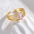 Detail view of gold beaded multi-layer ring featuring a pink pear-cut zircon stone - Pink Water Drop Gemstone Style (S-R701-sdx)