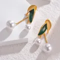 French vintage gold earrings with green leaf details and long hanging white pearls - Enamel Leaf Pearl Style (SFLE732)