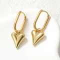 French vintage style heart drop earrings in polished gold metal on a white ceramic tray - Gold (SFLE714)
