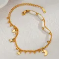 Detail of 18K gold plated steel double layer bracelet with star and moon charms - White Bead Star Moon Double Layer Chain (SFLB1036)