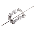 Macro shot of antique silver hollow alloy hair crown and pin set for DIY jewelry - Silver