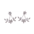 Macro detail of silver floral jacket earrings with sparkling rhinestones and petal accents - Silver