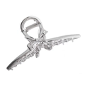 Macro detail of silver metal butterfly hair claw clip with polished mirror finish - Silver