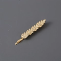 Elegant gold leaf hair clip with clear rhinestones in a feather design for women - Gold