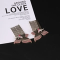 Roze vlinder haarkam set met fonkelende kristallen en elegante goudkleurige afwerking - Antiek Goud