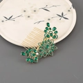 Dettaglio del pettine per capelli dorato con cristalli smeraldo e perline - Stile in Lega Dorata con Strass Smeraldo / Verde