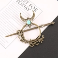 Vintage bronze hair slide set with crescent moon and branch design featuring turquoise - Dark Gold
