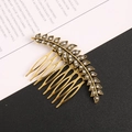 Vintage gouden bladharkam met fonkelende steentjes voor elegante haarstyling - Antiek Goud