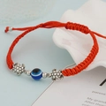 Handmade red braided turtle bracelet with blue evil eye charm and adjustable string - Red Sea Turtle (BN-0149-6)