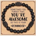 Matte black agate and lava stone beaded heart bracelet on a kraft gift card - Square Lava Stone Message Style (With Card)