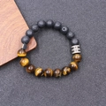 Macro shot of tiger eye and lava stone beads with silver metallic spacers on men's bracelet - Lava Stone Tiger Eye (BNS-0377)