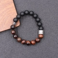Macro shot of tiger eye and black matte stone beads on men's elastic bracelet - Red Tiger Eye Matte (BNS-0377)